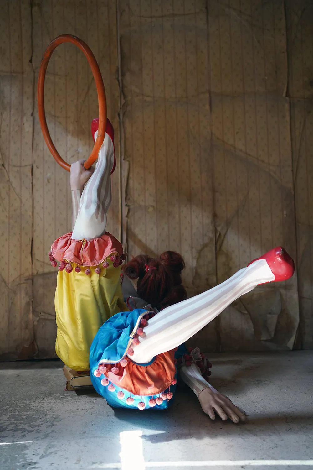 A 20thC Lifesize Painted Plaster & Silk Theatre Prop Model of an Acrobatic Clown by Mark Thompson