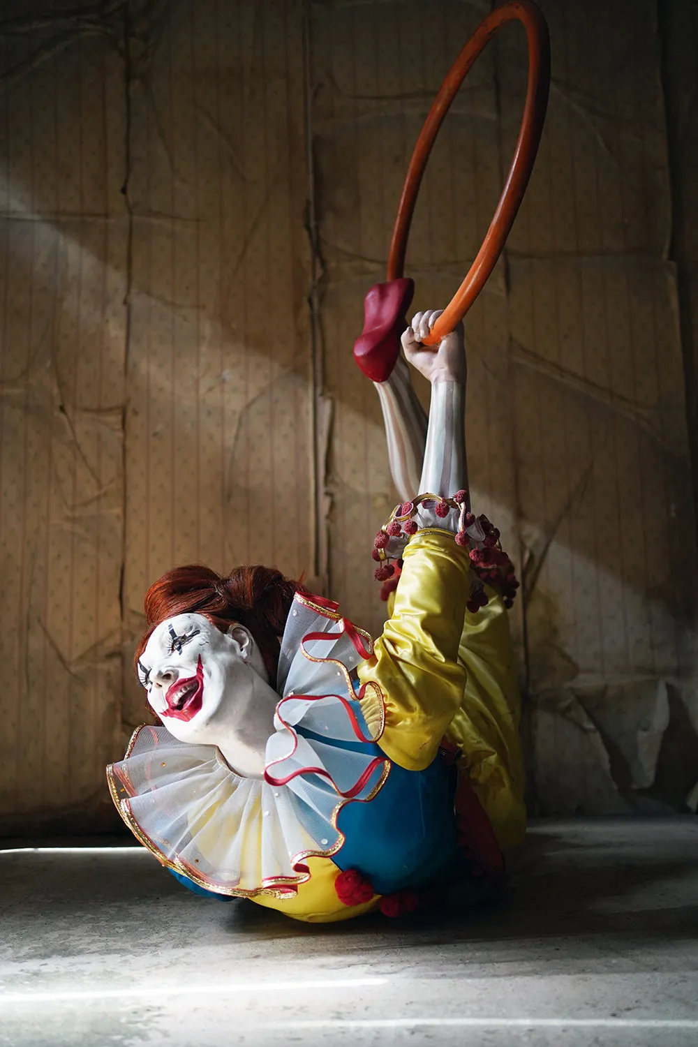 A 20thC Lifesize Painted Plaster & Silk Theatre Prop Model of an Acrobatic Clown by Mark Thompson