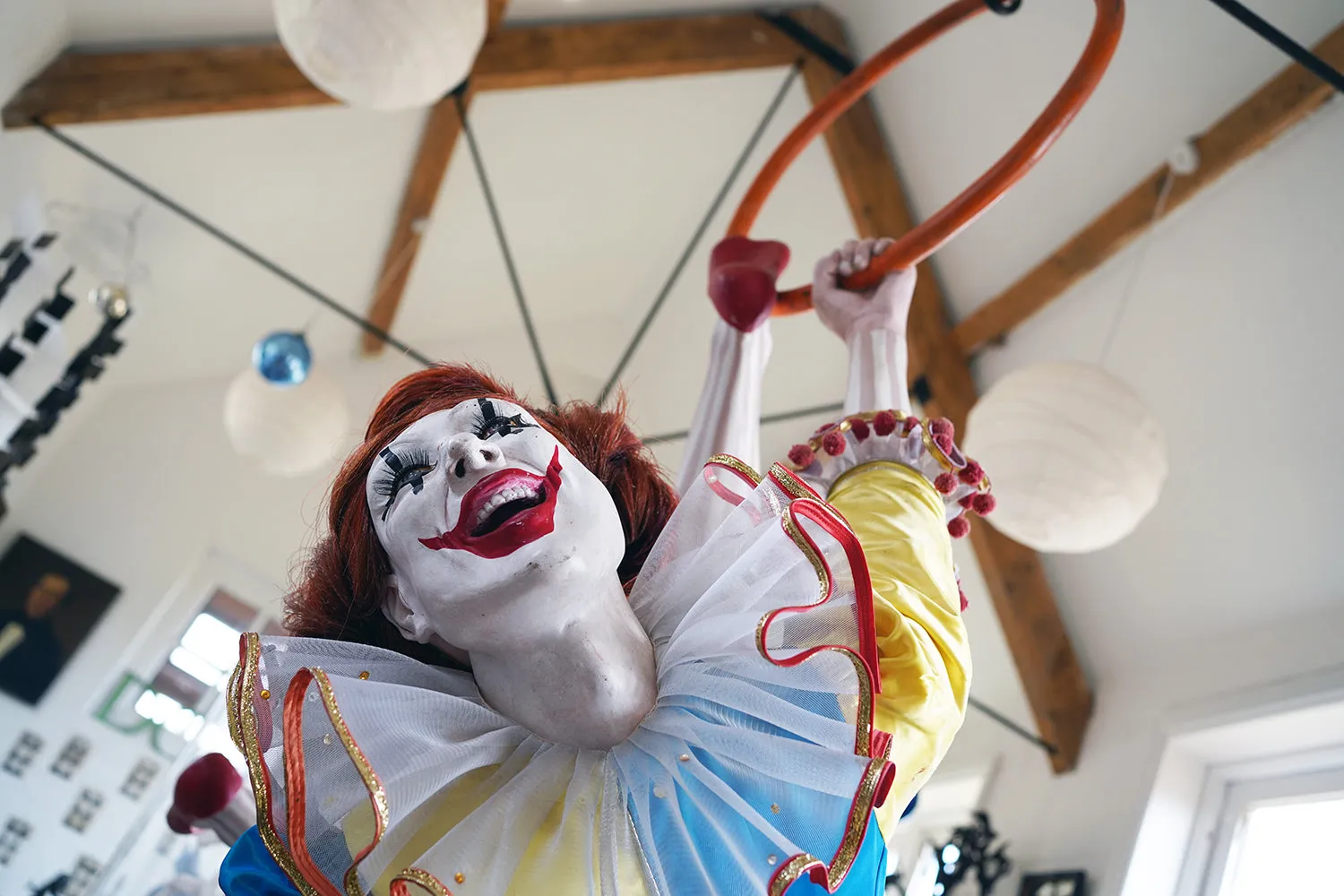 A 20thC Lifesize Painted Plaster & Silk Theatre Prop Model of an Acrobatic Clown by Mark Thompson