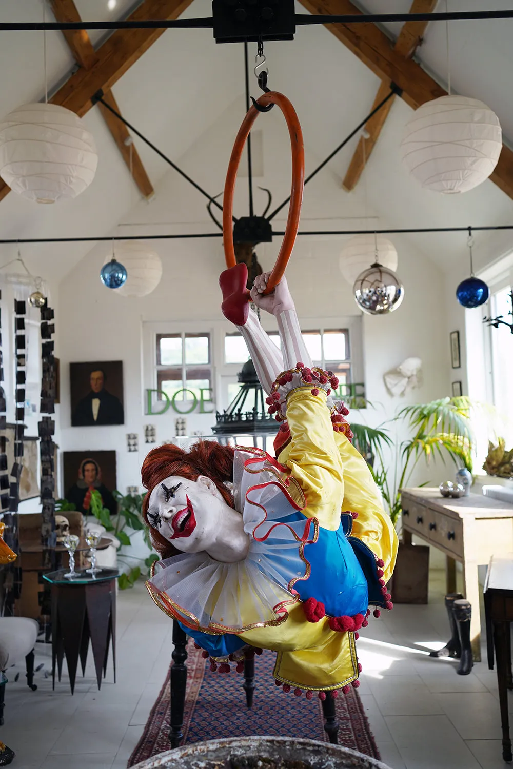 A 20thC Lifesize Painted Plaster & Silk Theatre Prop Model of an Acrobatic Clown by Mark Thompson