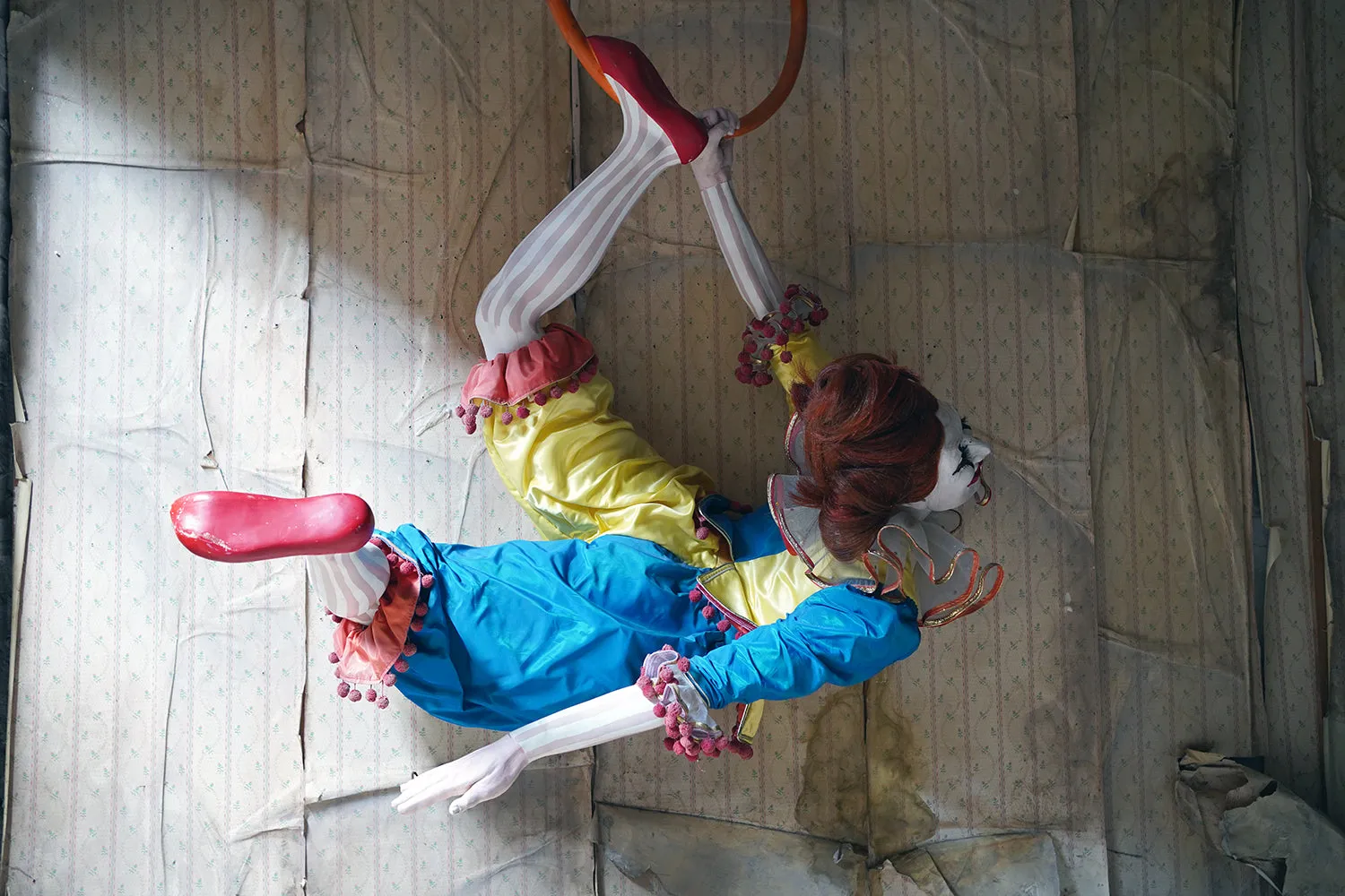 A 20thC Lifesize Painted Plaster & Silk Theatre Prop Model of an Acrobatic Clown by Mark Thompson