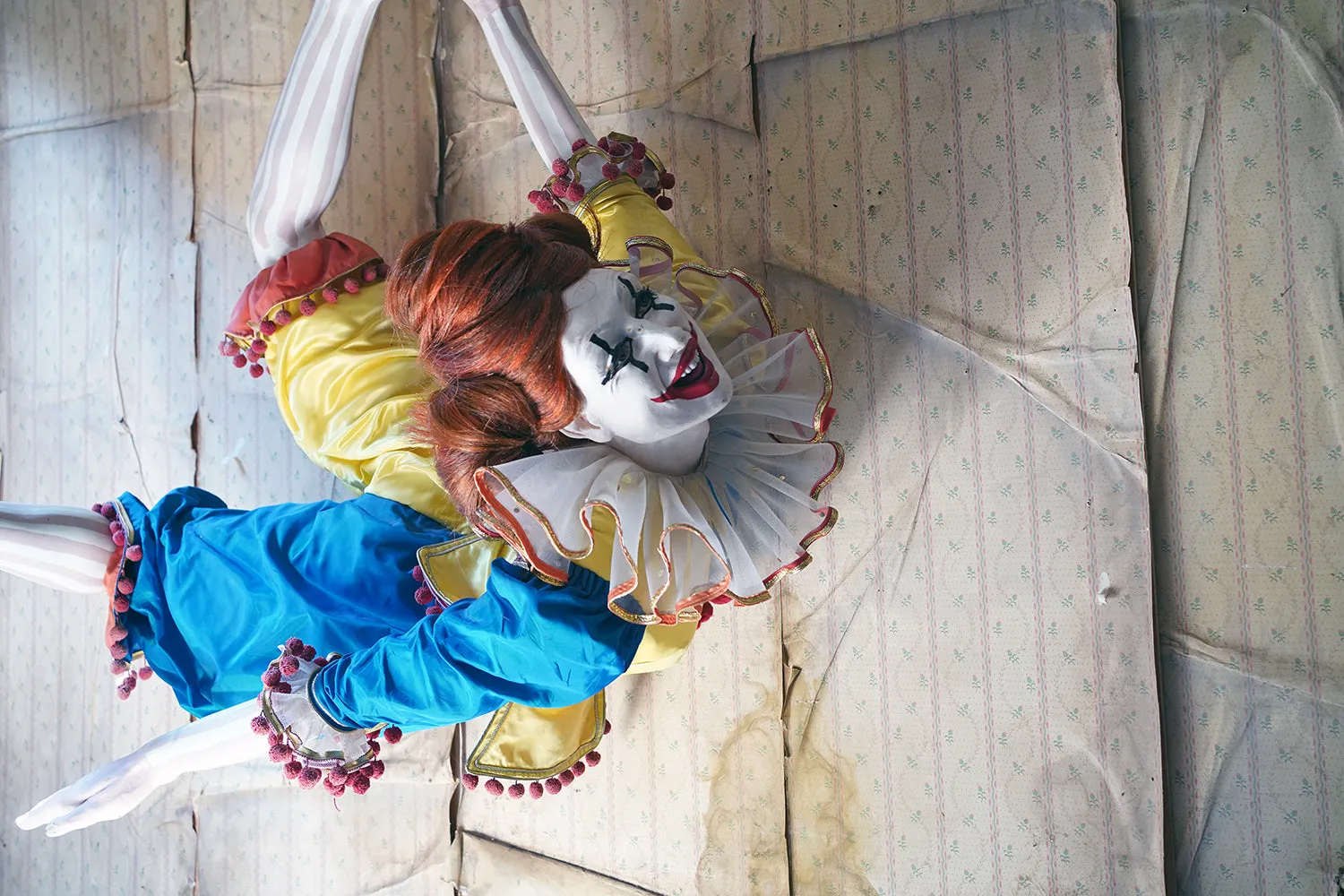 A 20thC Lifesize Painted Plaster & Silk Theatre Prop Model of an Acrobatic Clown by Mark Thompson