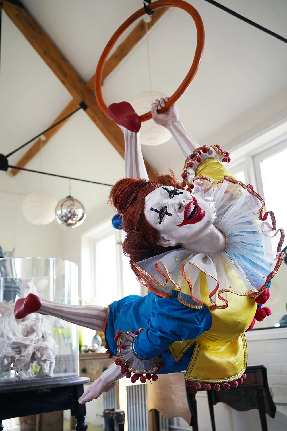 A 20thC Lifesize Painted Plaster & Silk Theatre Prop Model of an Acrobatic Clown by Mark Thompson