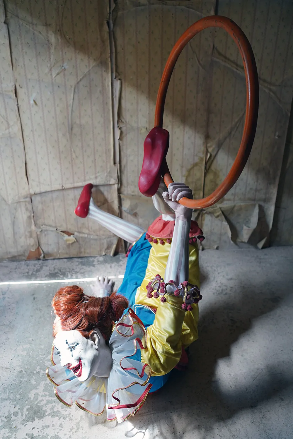 A 20thC Lifesize Painted Plaster & Silk Theatre Prop Model of an Acrobatic Clown by Mark Thompson