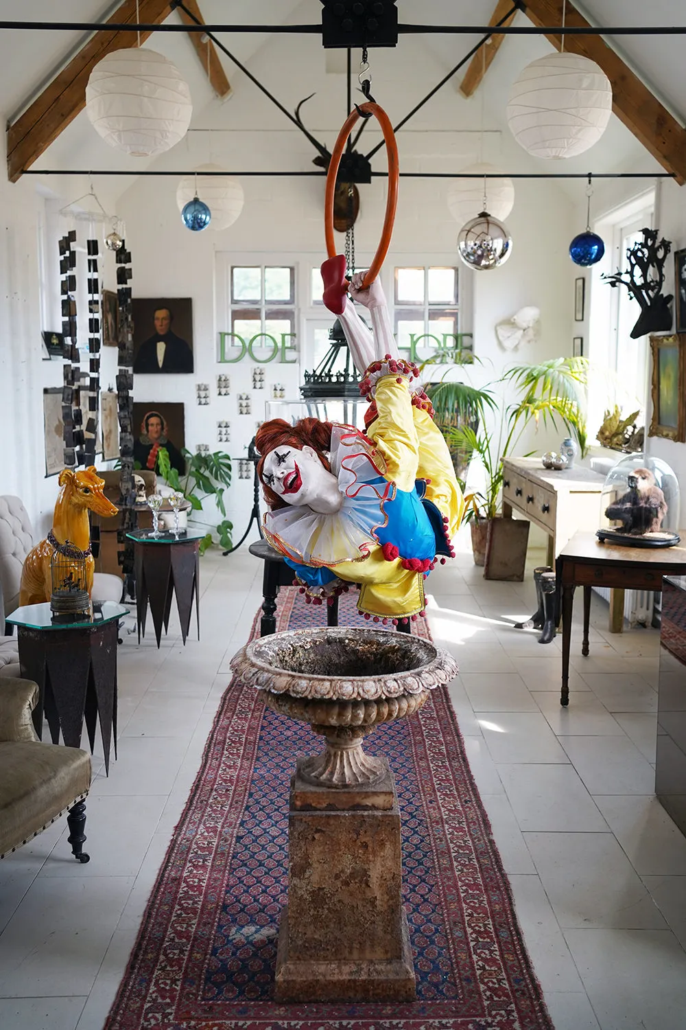 A 20thC Lifesize Painted Plaster & Silk Theatre Prop Model of an Acrobatic Clown by Mark Thompson