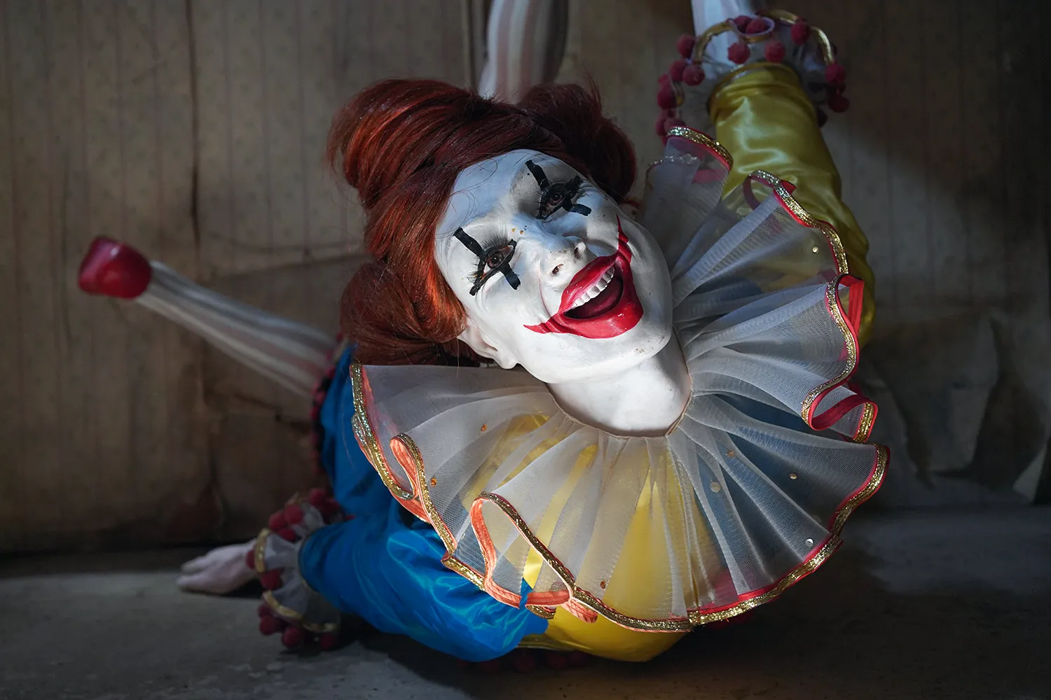 A 20thC Lifesize Painted Plaster & Silk Theatre Prop Model of an Acrobatic Clown by Mark Thompson