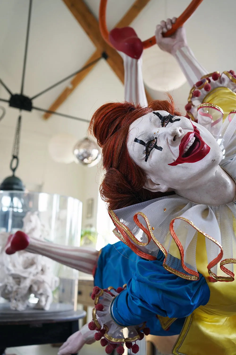 A 20thC Lifesize Painted Plaster & Silk Theatre Prop Model of an Acrobatic Clown by Mark Thompson