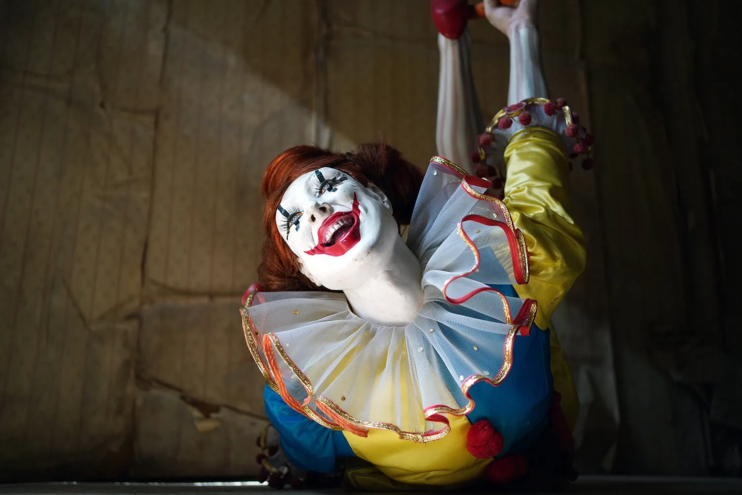 A 20thC Lifesize Painted Plaster & Silk Theatre Prop Model of an Acrobatic Clown by Mark Thompson