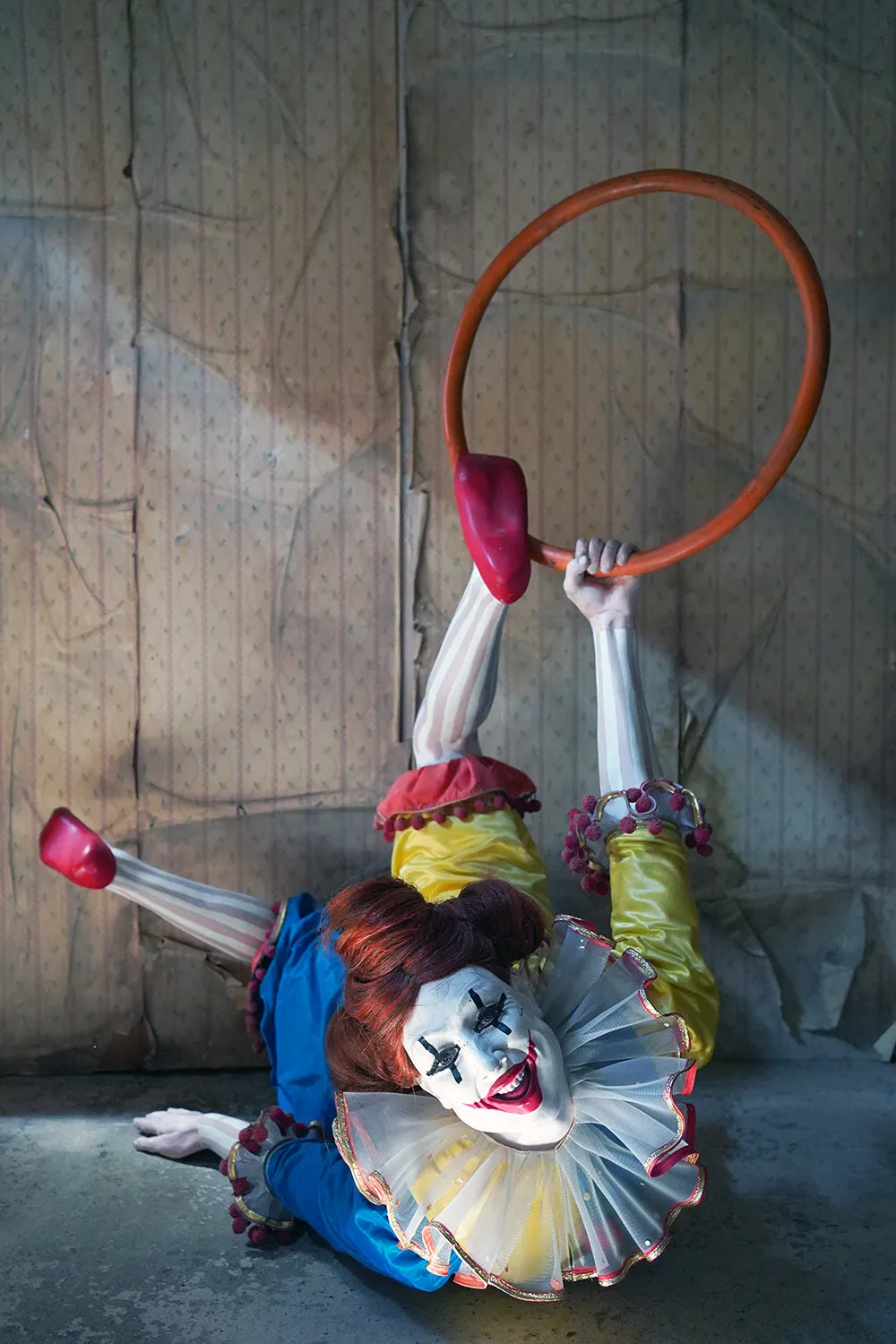 A 20thC Lifesize Painted Plaster & Silk Theatre Prop Model of an Acrobatic Clown by Mark Thompson