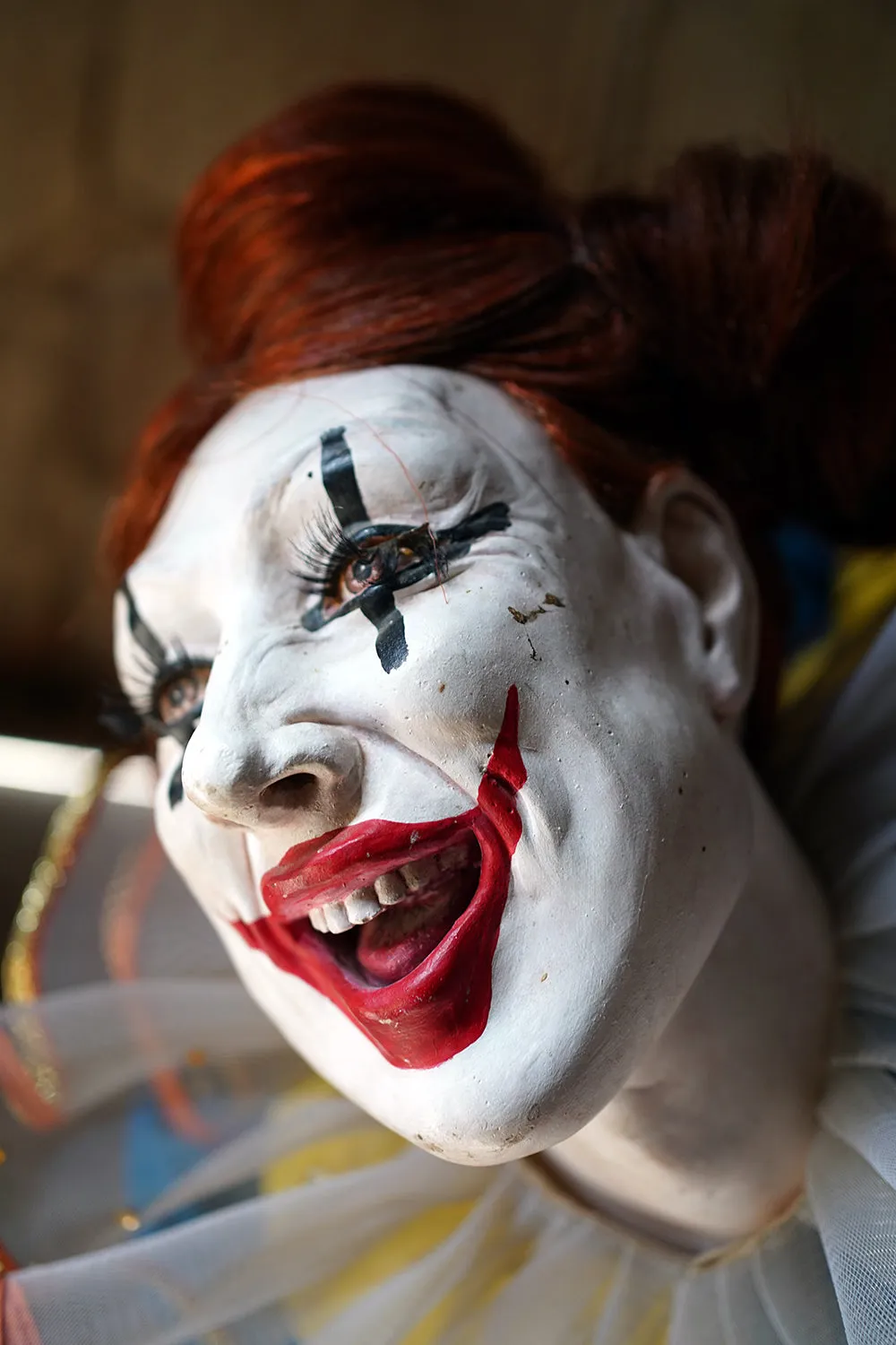 A 20thC Lifesize Painted Plaster & Silk Theatre Prop Model of an Acrobatic Clown by Mark Thompson