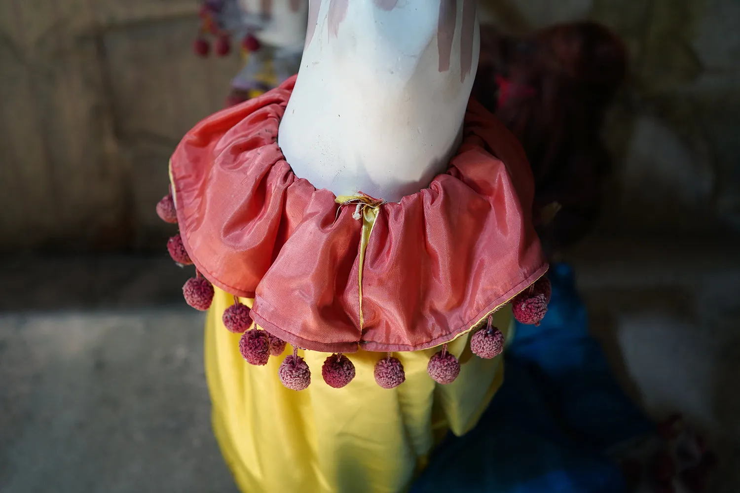 A 20thC Lifesize Painted Plaster & Silk Theatre Prop Model of an Acrobatic Clown by Mark Thompson