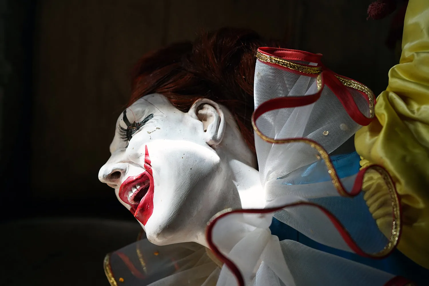 A 20thC Lifesize Painted Plaster & Silk Theatre Prop Model of an Acrobatic Clown by Mark Thompson