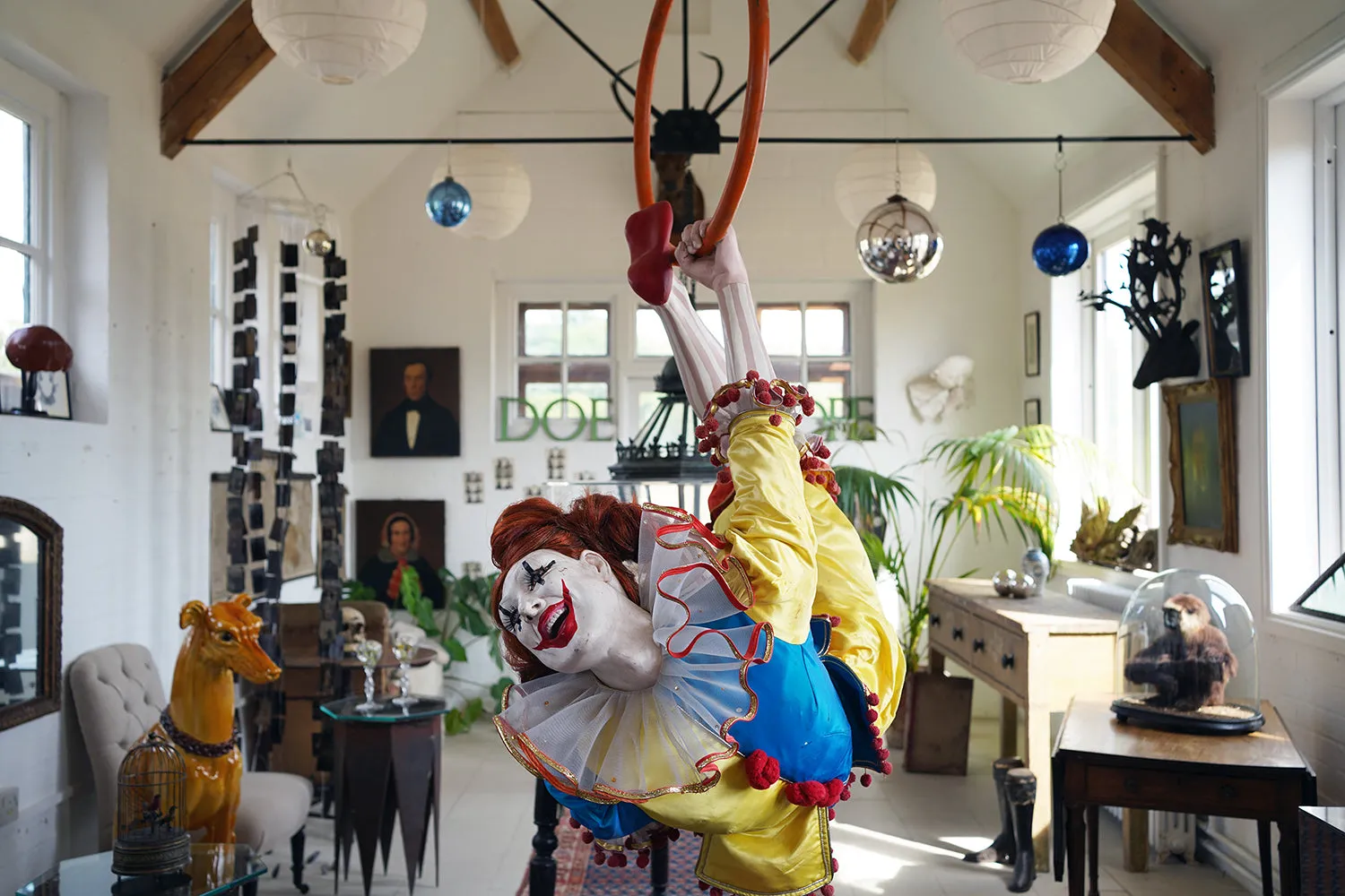 A 20thC Lifesize Painted Plaster & Silk Theatre Prop Model of an Acrobatic Clown by Mark Thompson