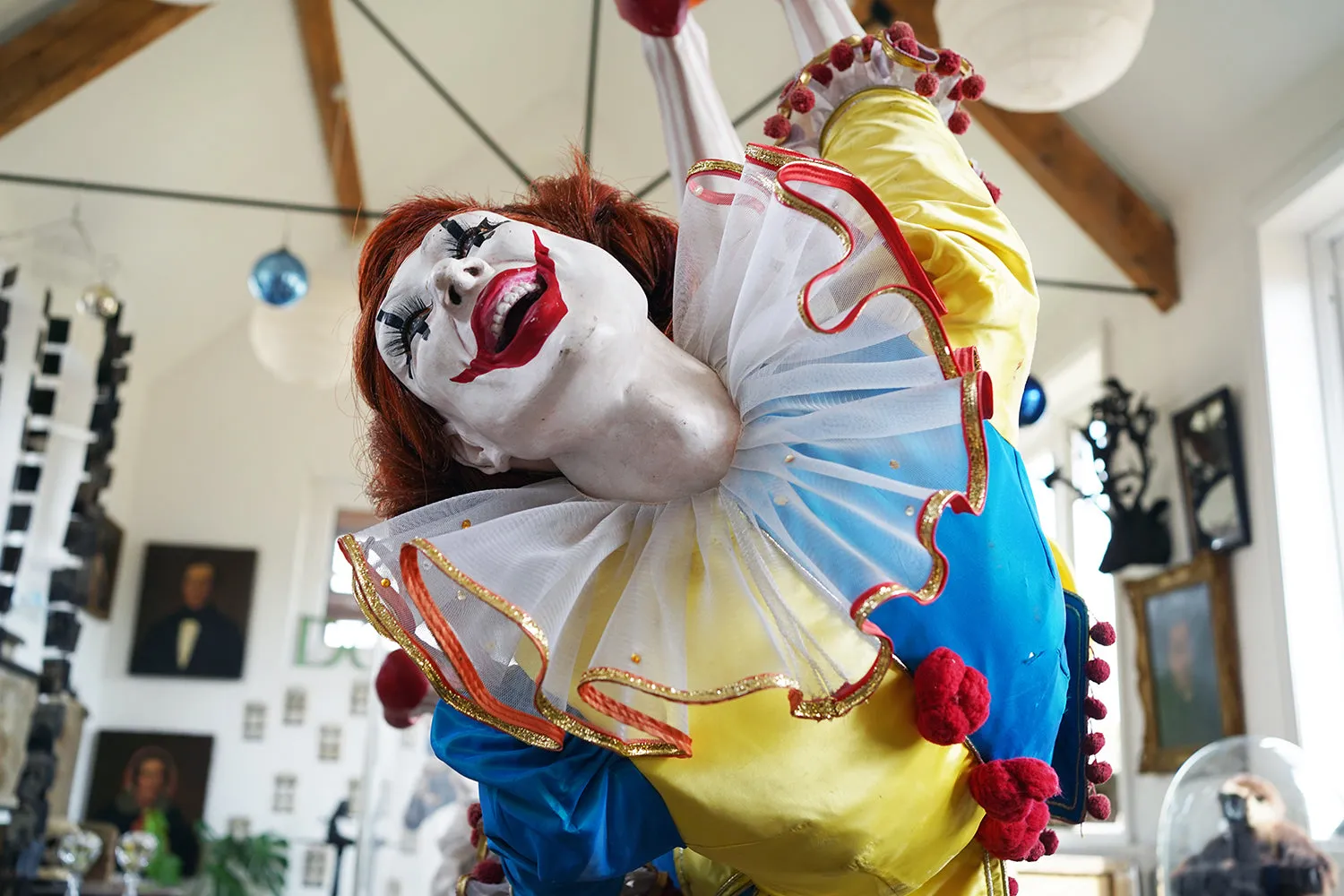 A 20thC Lifesize Painted Plaster & Silk Theatre Prop Model of an Acrobatic Clown by Mark Thompson